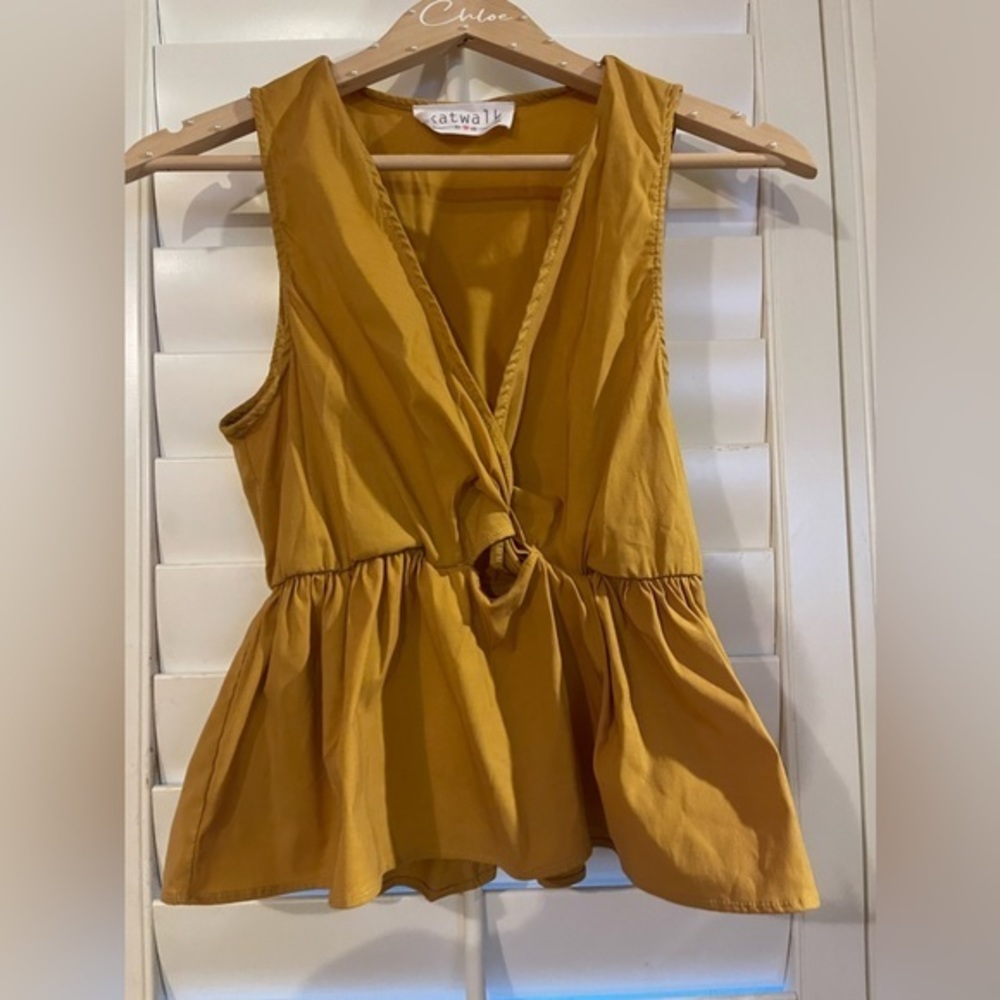 DONATING 03-15 Katwalk mustard peplum front knot blouse, size medium.‎